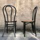 Two pairs of black 50s chairs - number 18 - cannée