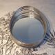Oval wall mirror in chrome metal