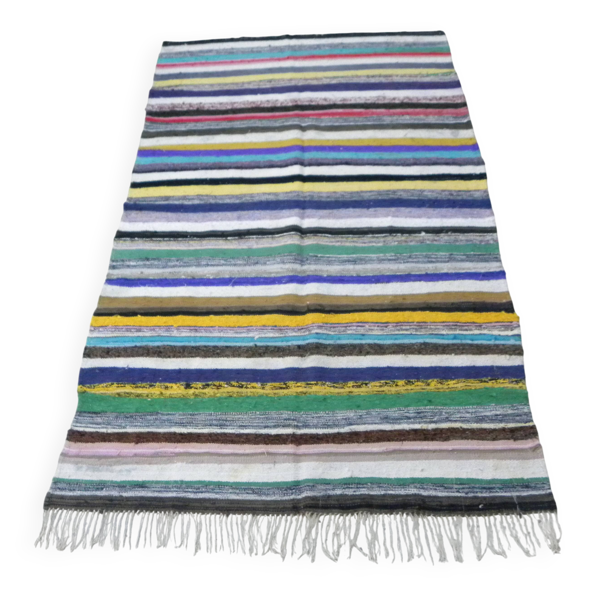 Vintage traditional nomadic kilim ethnic rug with multicoloured stripes.