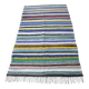 Vintage traditional nomadic kilim ethnic rug with multicoloured stripes.