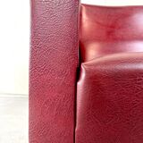 Vintage burgundy armchair, compass base in black metal and brass