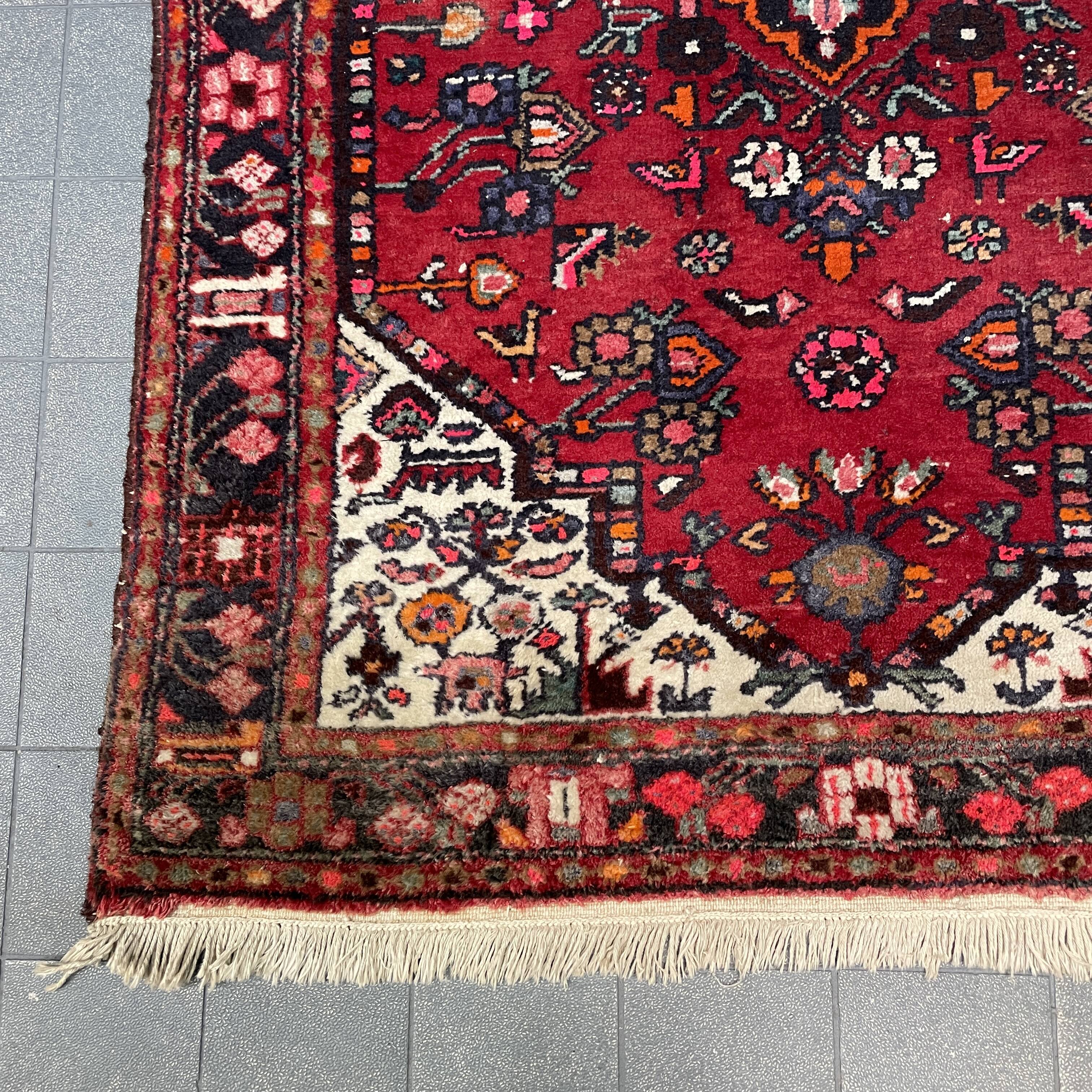 Worn vintage oriental rug or carpet