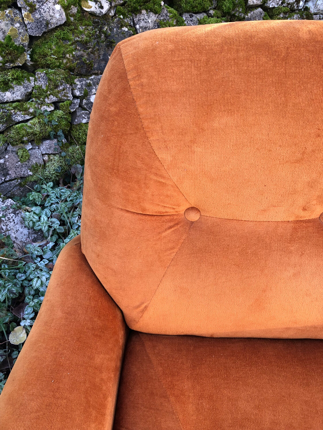 Orange velvet armchair