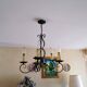 Antique wrought iron chandelier with 5 branches.