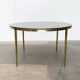 Mid-century Hollywood Regency style coffee table in brass and glass, made in Germany by Vereinigte Werkstätten, 1960s.