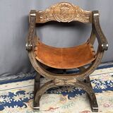 Dagobert style armchair. Solid walnut, leather.