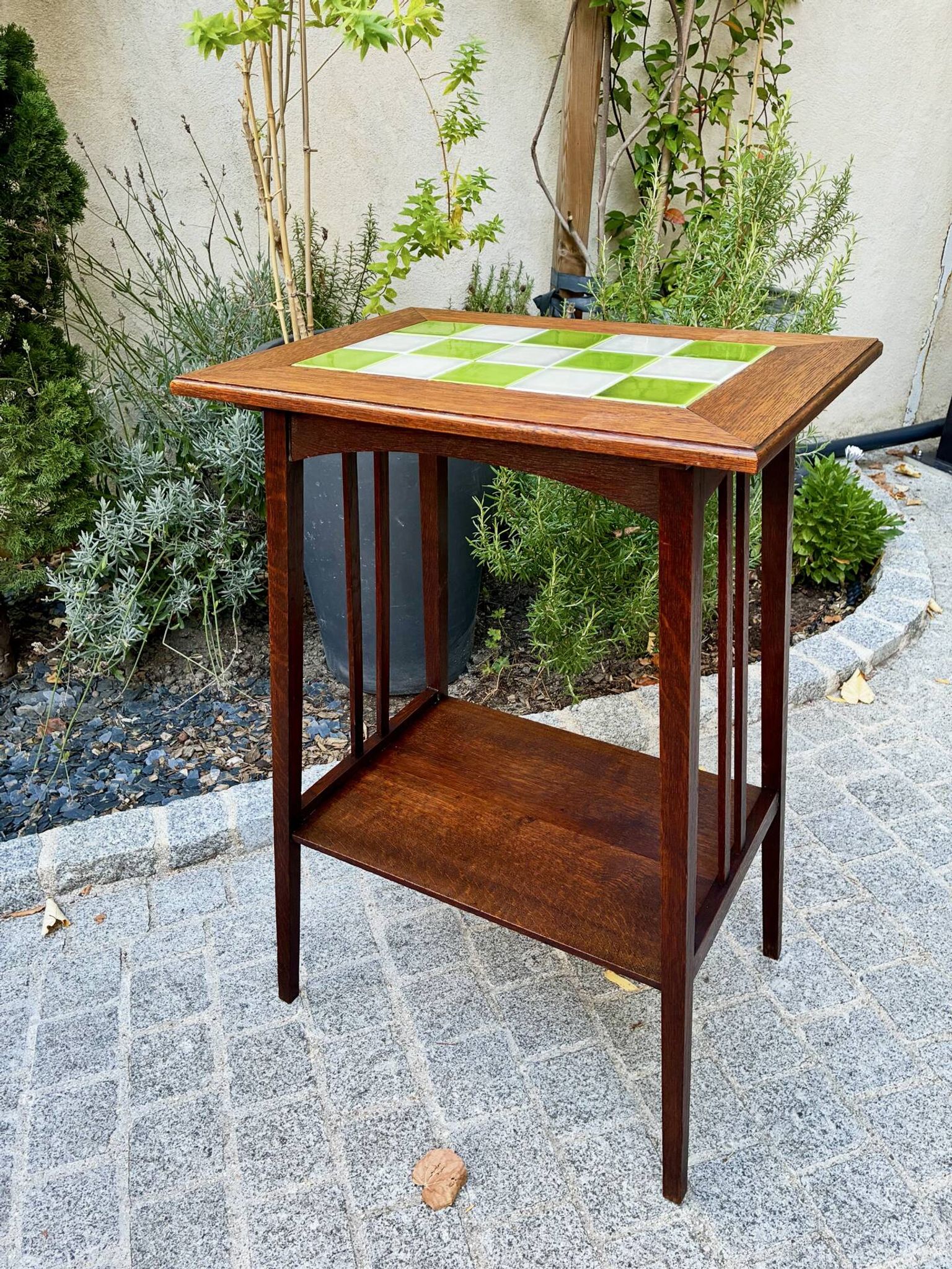 Art Nouveau side table 1910 with double tops in dark oak.