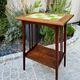 Art Nouveau side table 1910 with double tops in dark oak.