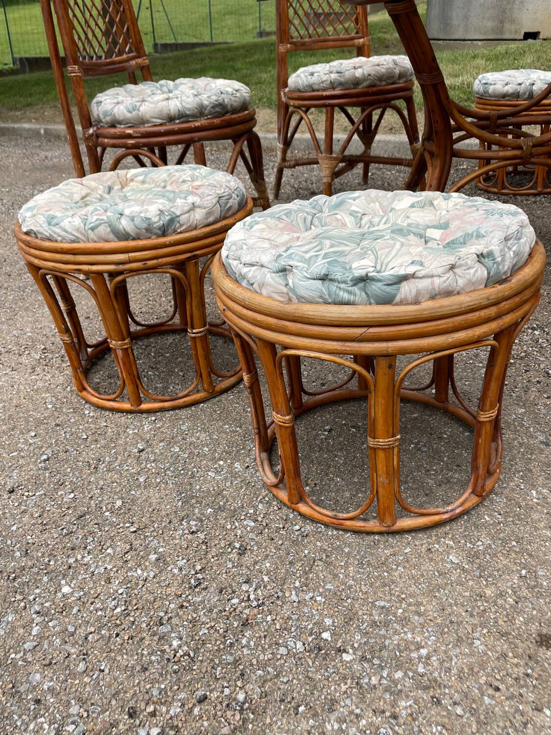 Vintage rattan dining set with glass table, 4 chairs and 4 stools.