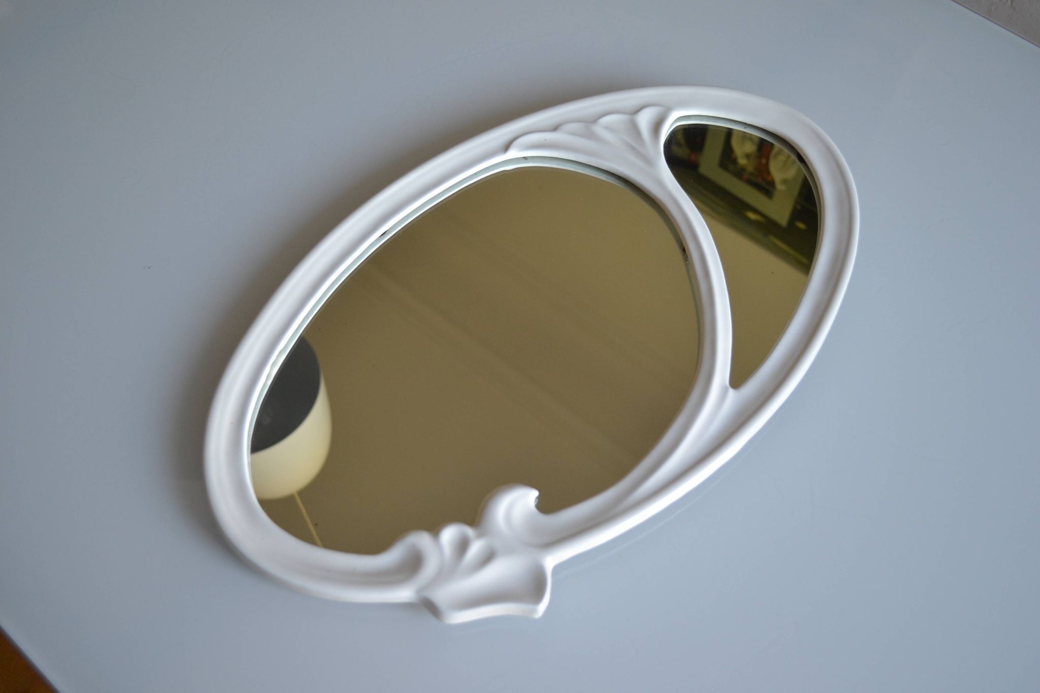 Oval mirror in art nouveau jugendstil style in enamelled cast iron 49 x 29