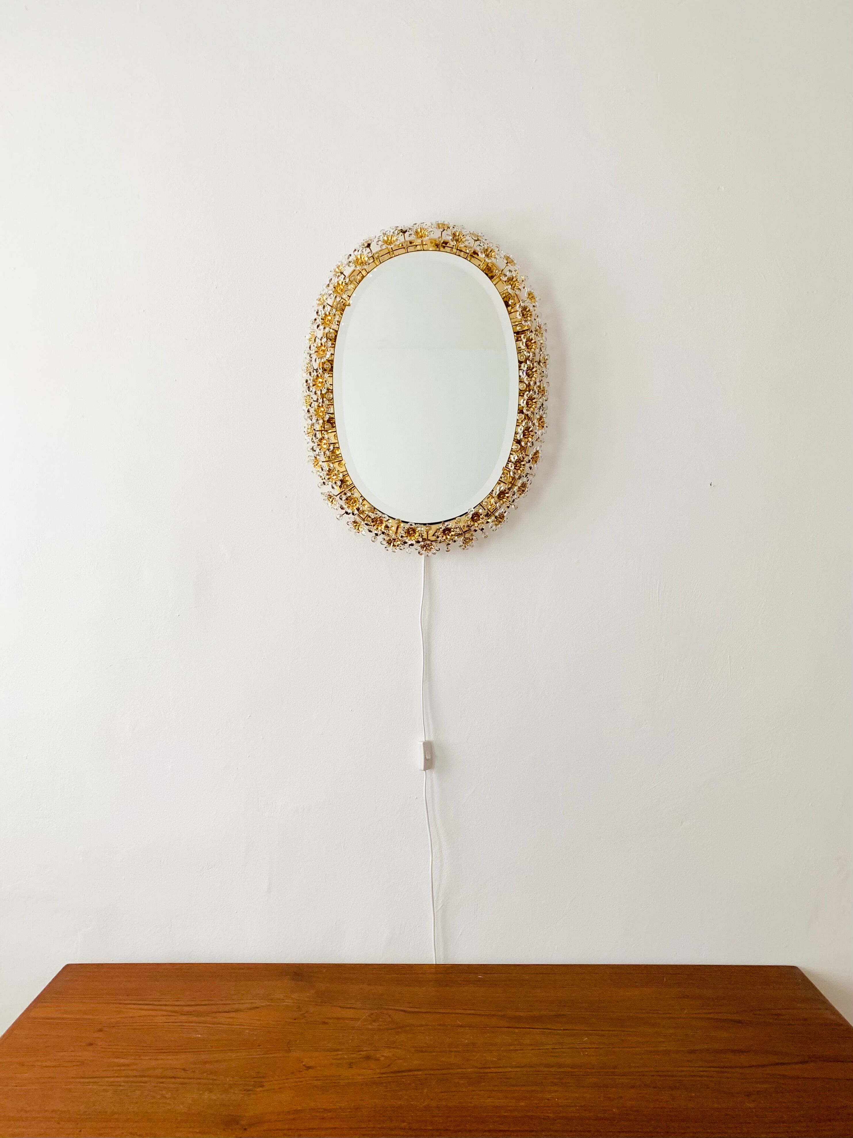 Illuminated floral mirror by Palwa