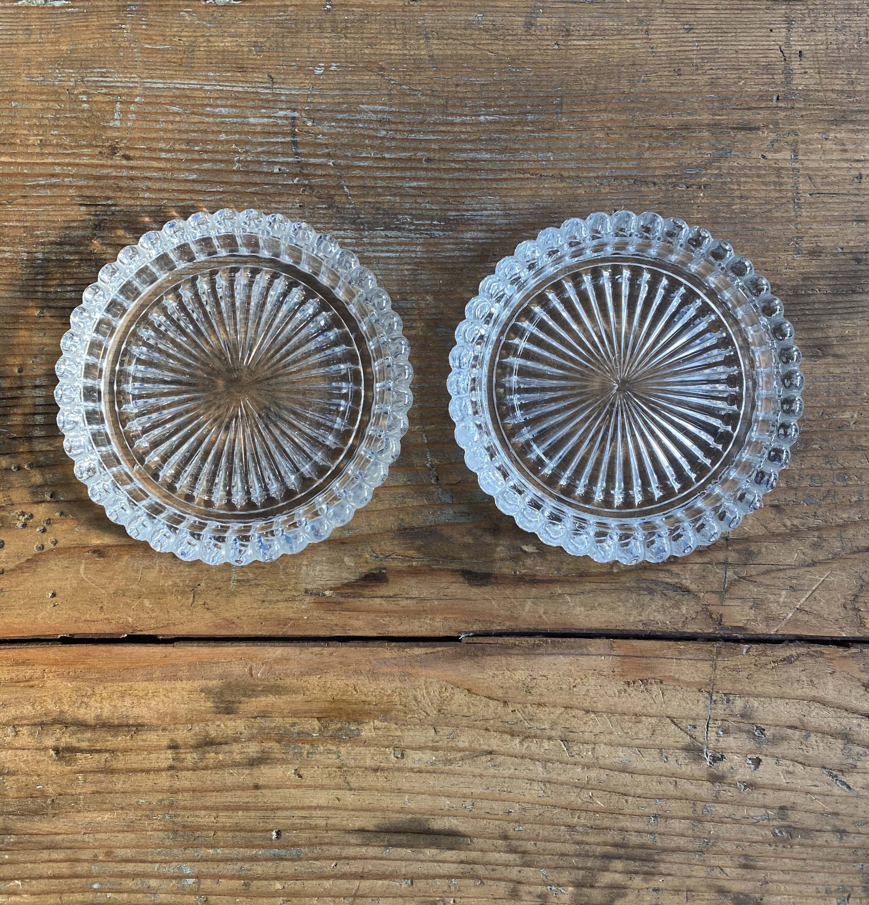 Lot de 2 dessous de bouteilles en verre