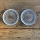 Lot de 2 dessous de bouteilles en verre