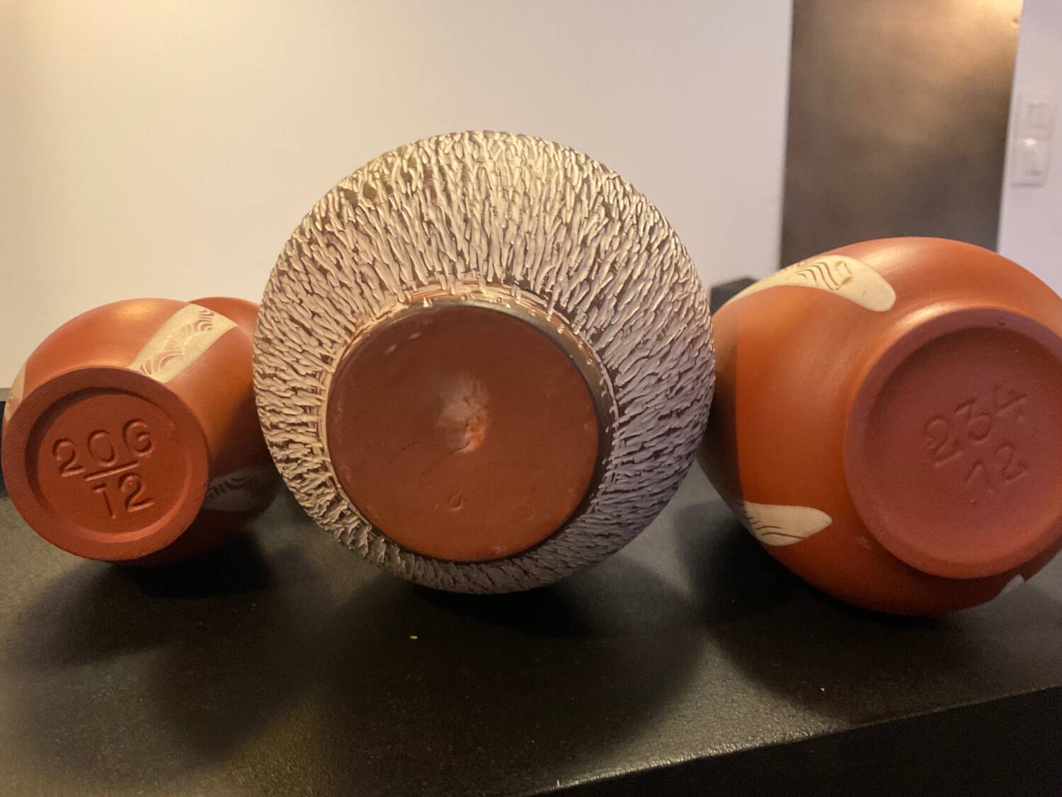Series of 3 vintage chiseled terracotta vases