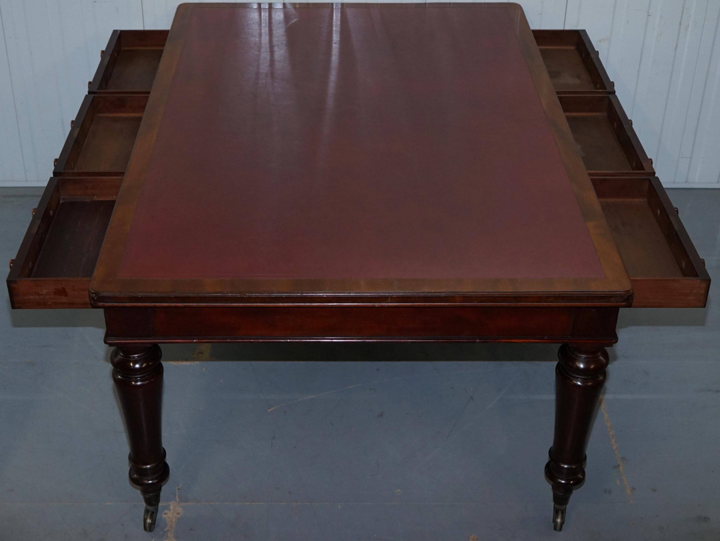 Rare double-sided desk in hardwood by Holland and Sons, Victorian era.