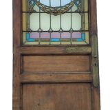 porte en chêne avec des vitraux