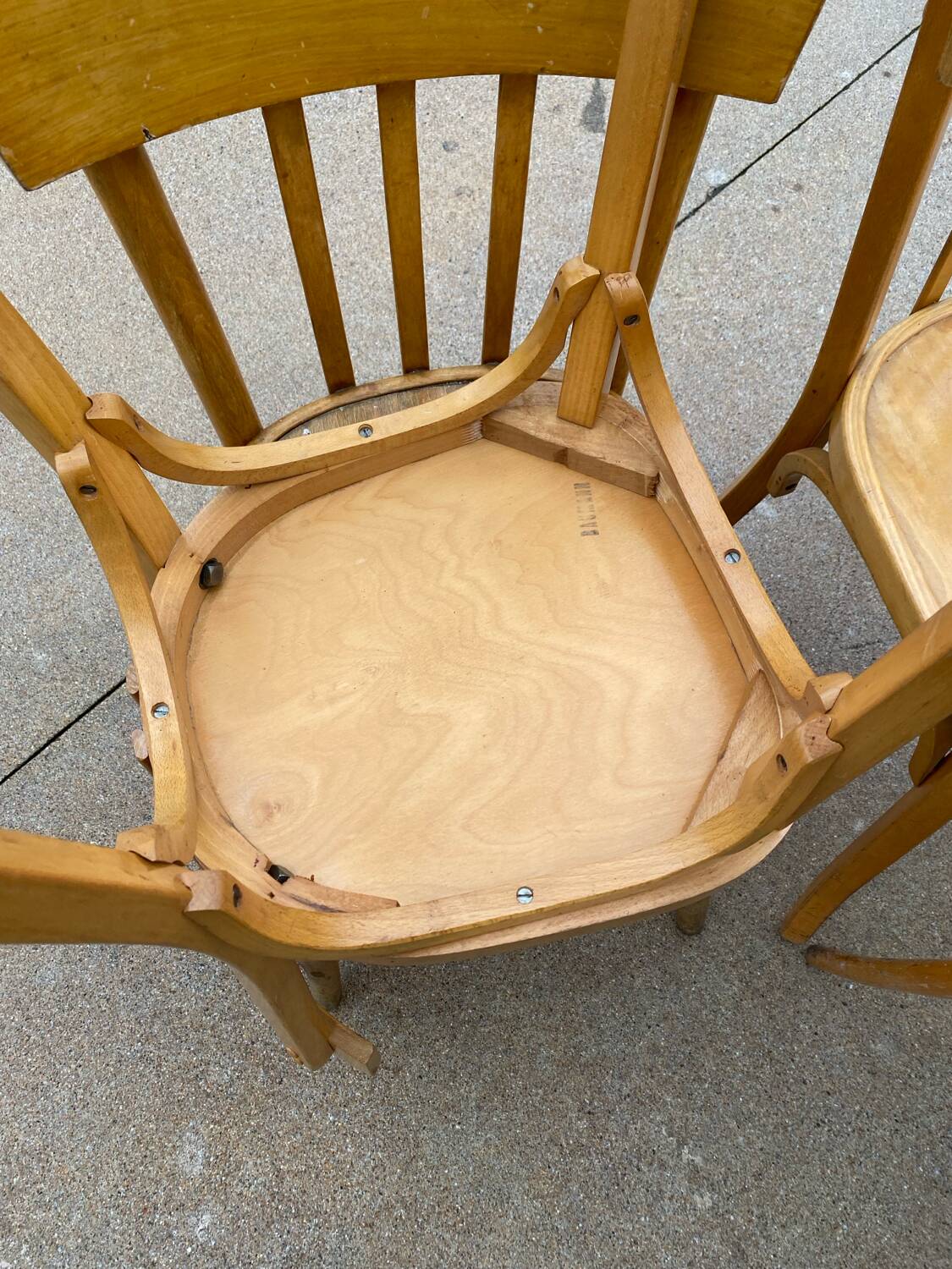 Curved varnished bistro chairs