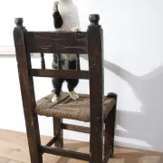 17th-century farmhouse chair with carved motifs – wabi sabi