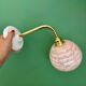 Vintage pink Clichy glass globe wall light.