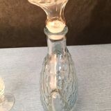 Worked glass carafe and flower-shaped stopper