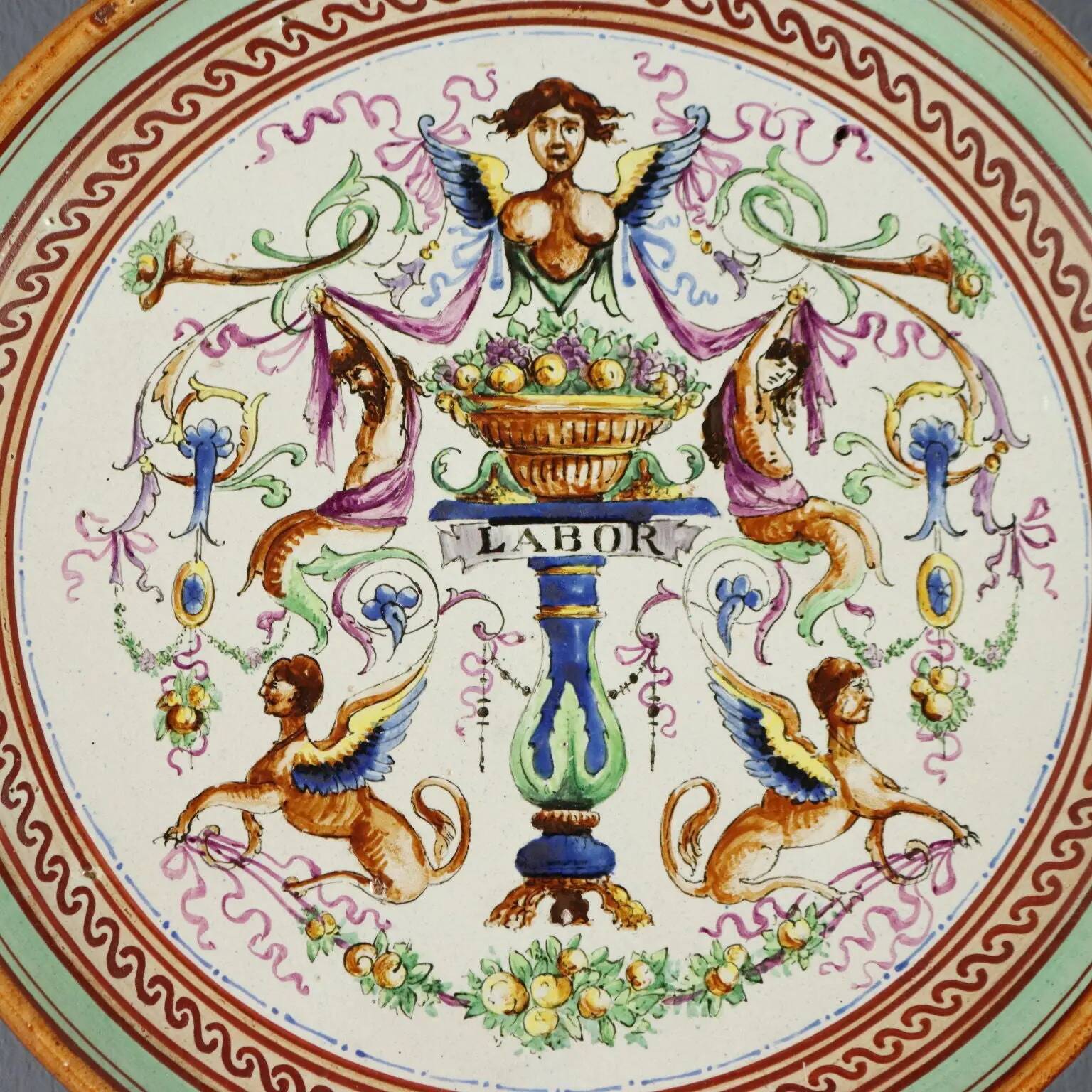 Antique majolica plate decorated with fruits, Italy, 20th century.