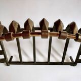 Old cast iron and brass log holder