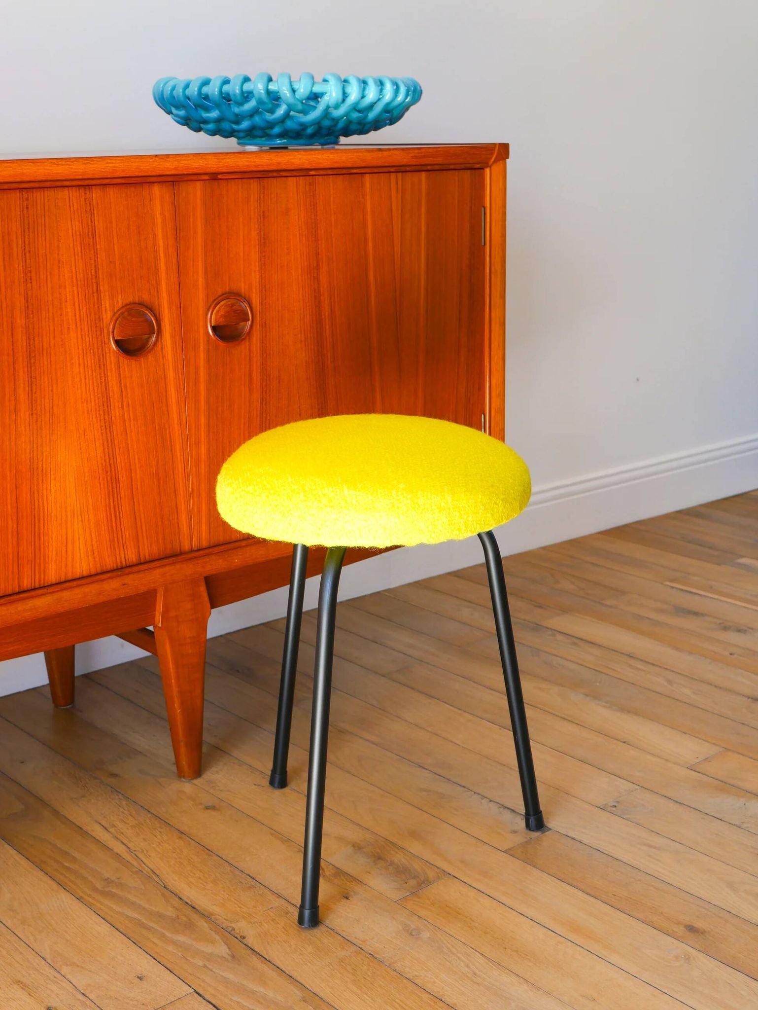 Black iron tripod stool with boiled wool, yellow, 1960.