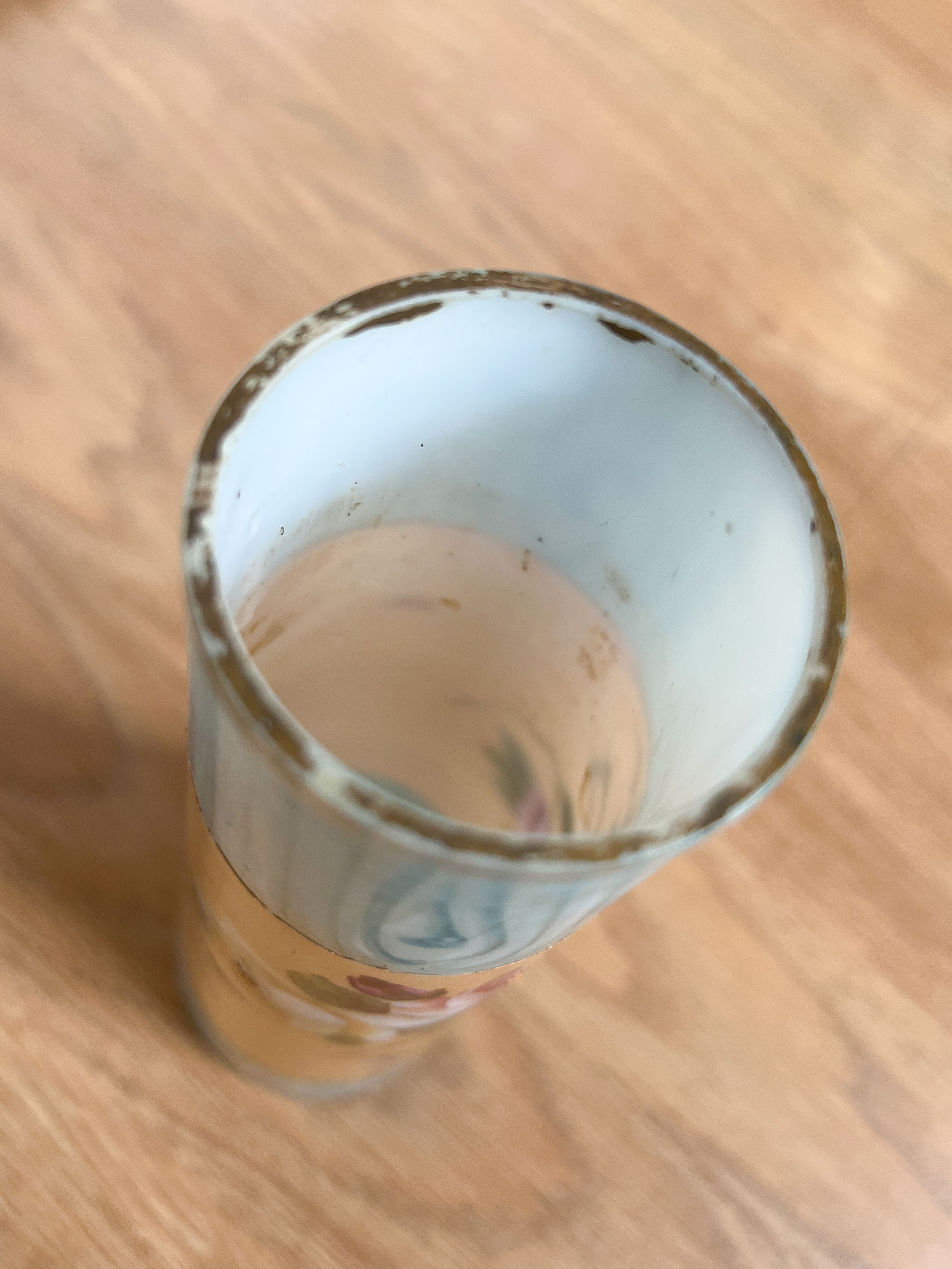 Blue and beige vase with flower pattern