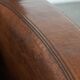 Beautifully shaped vintage sheepskin armchair with character