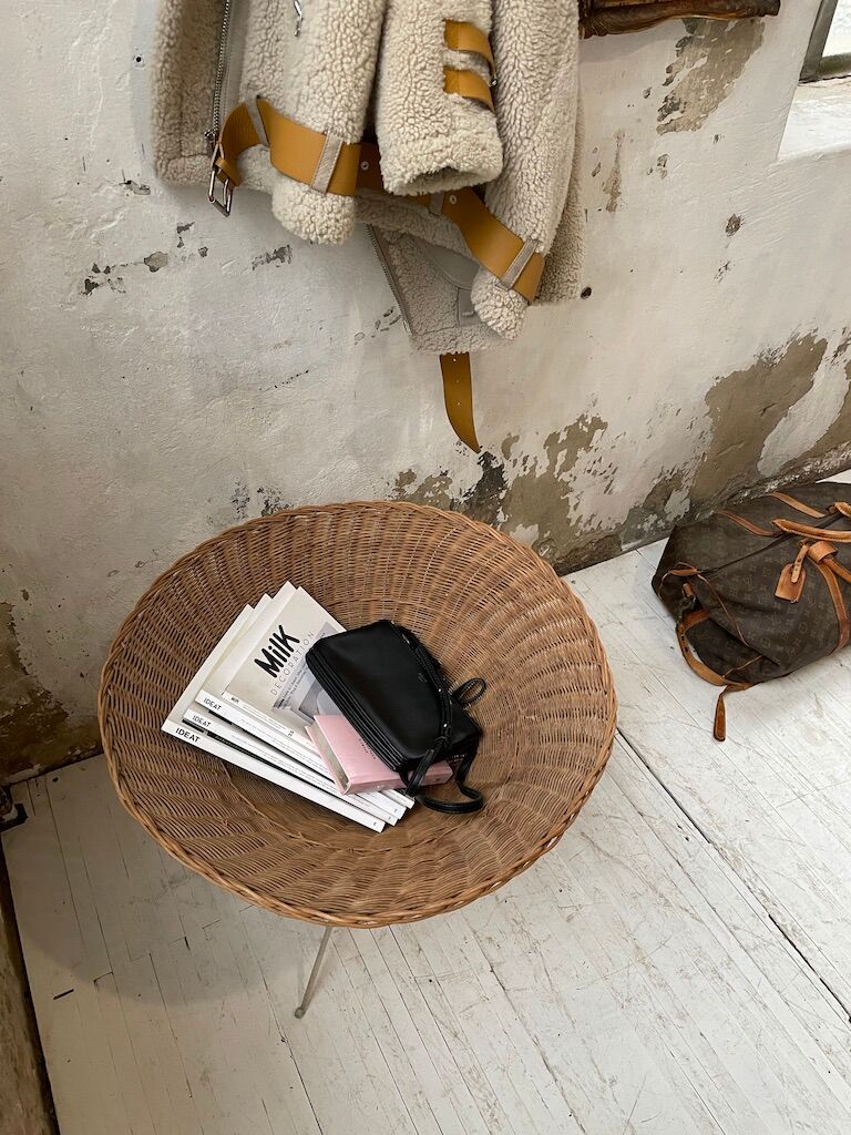 Wicker garden basket on tripod support