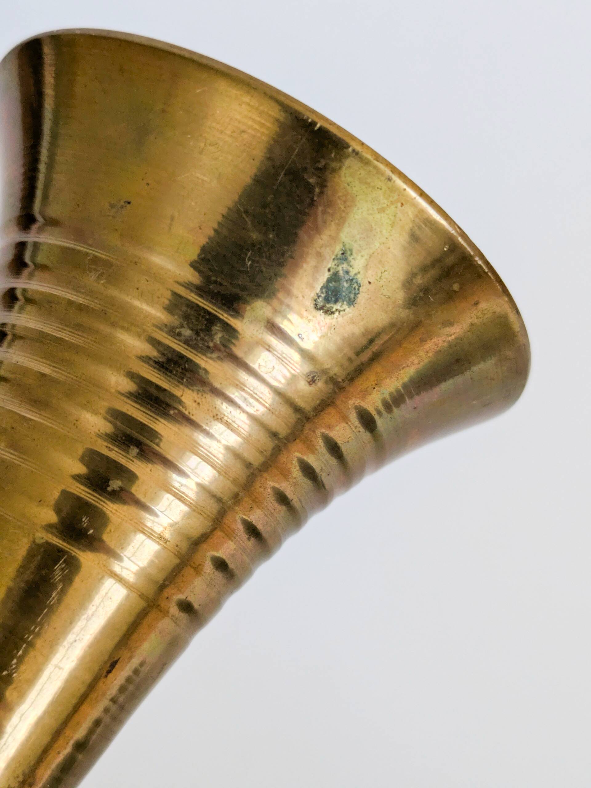 Solid brass Midcentury vase in trumpet shape with twisted details.