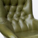 Fauteuil pivotant en cuir vert olive années 1970