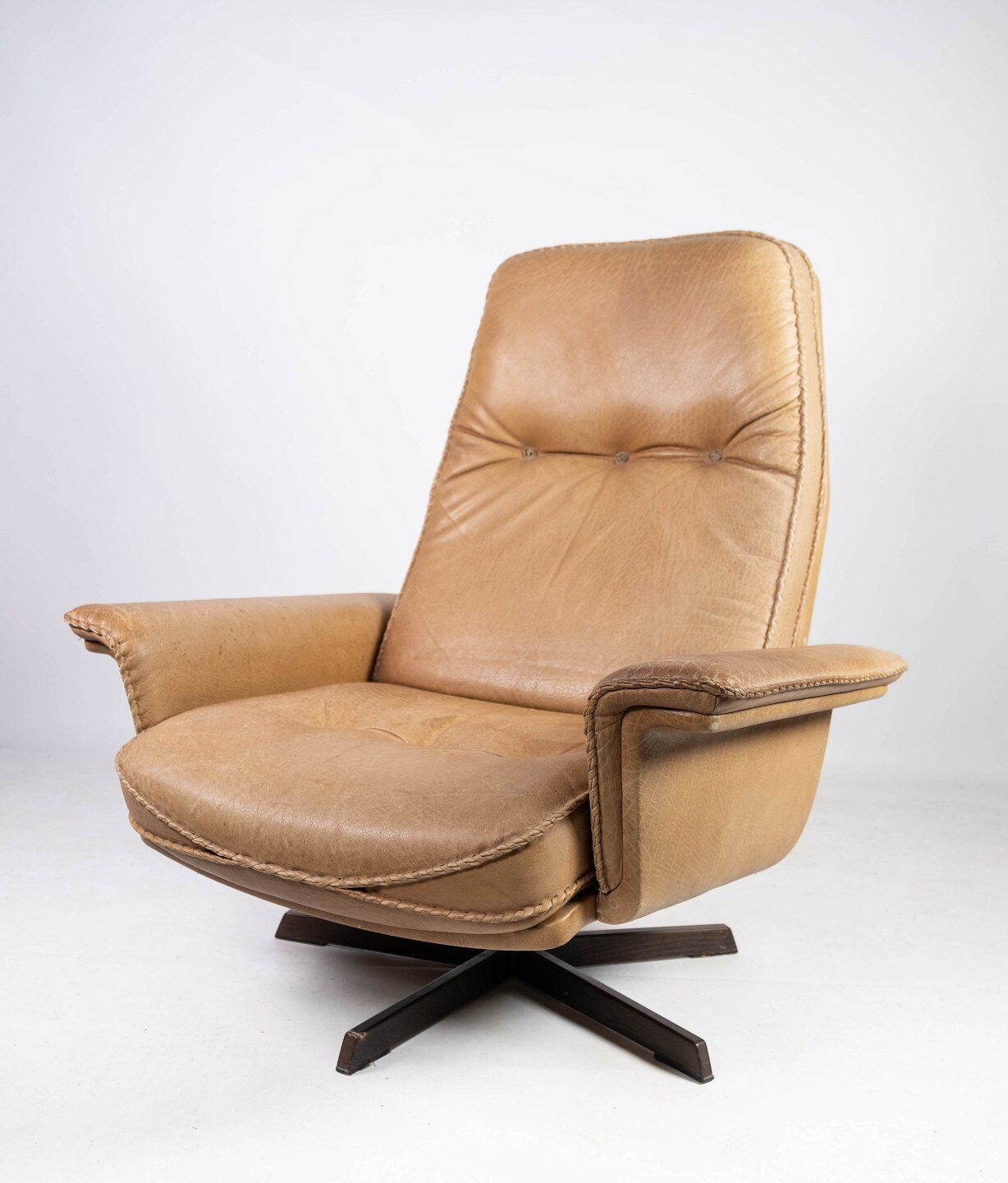Armchair and stool in 1960s Danish leather and rosewood