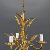 Golden suspension on ears of wheat, circa 1960