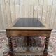 Flat desk in Louis XIII style made of walnut and leather.