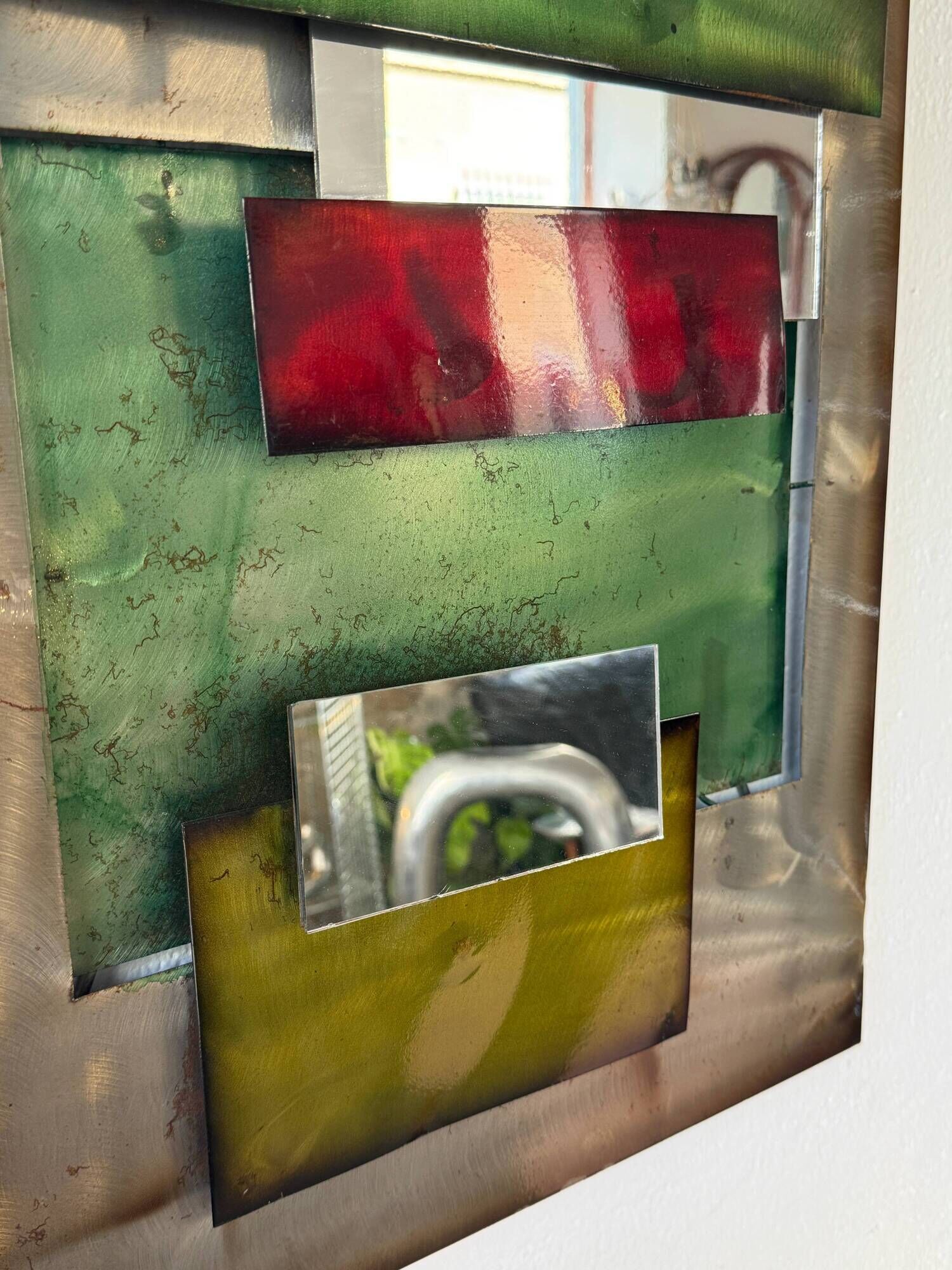 Large metal "polychrome" mirror — 1970s