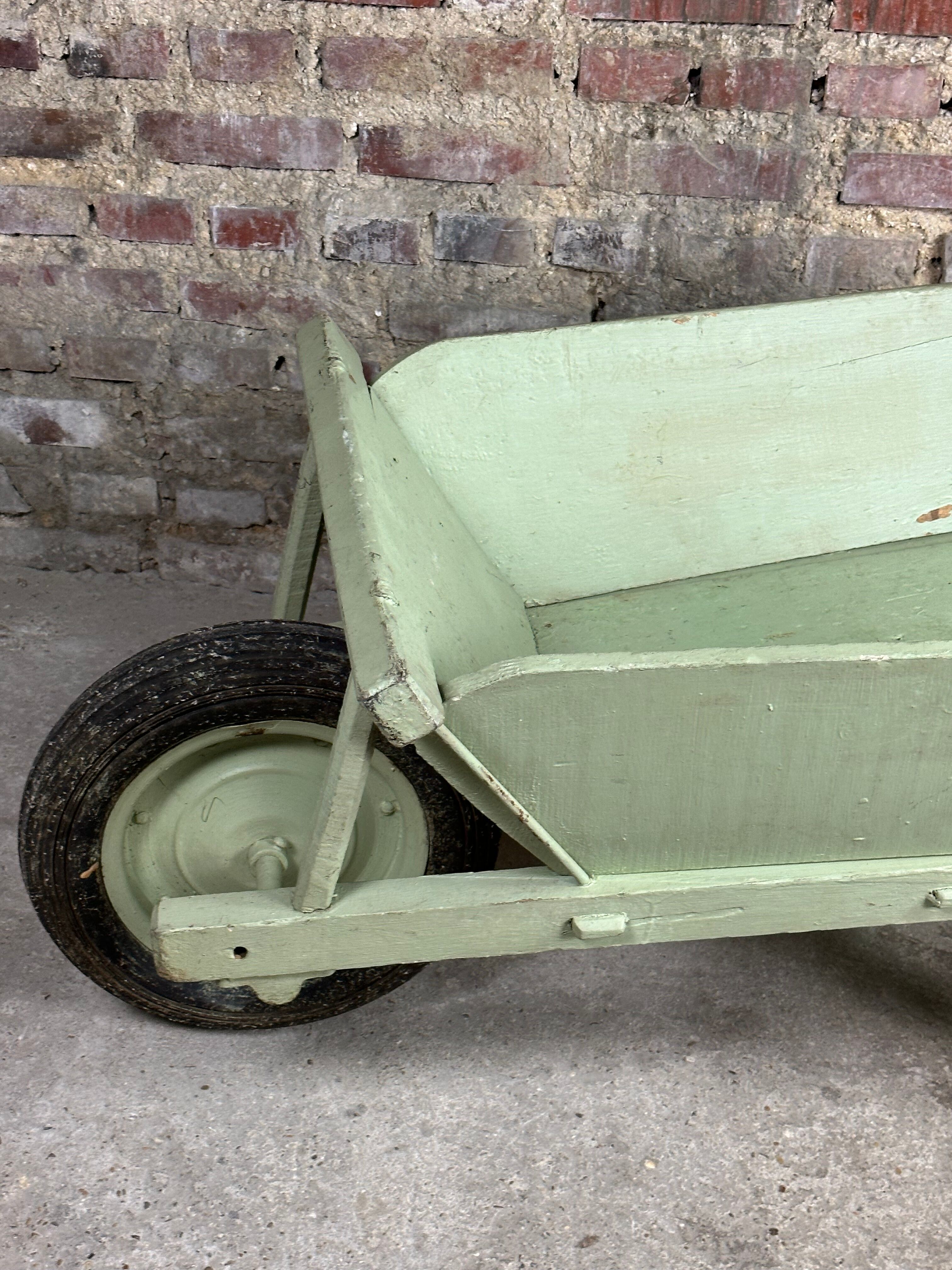Antique wooden wheelbarrow