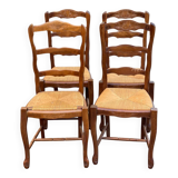 4 Louis XV chairs in solid oak with rush seats, shell carvings, 19th century.
