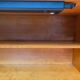 Secretary with drop-leaf in Louis XVI style, made of solid wood and brass, desk/commode.