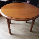 Round base table in cherry tree, 2 solid oak flaps
