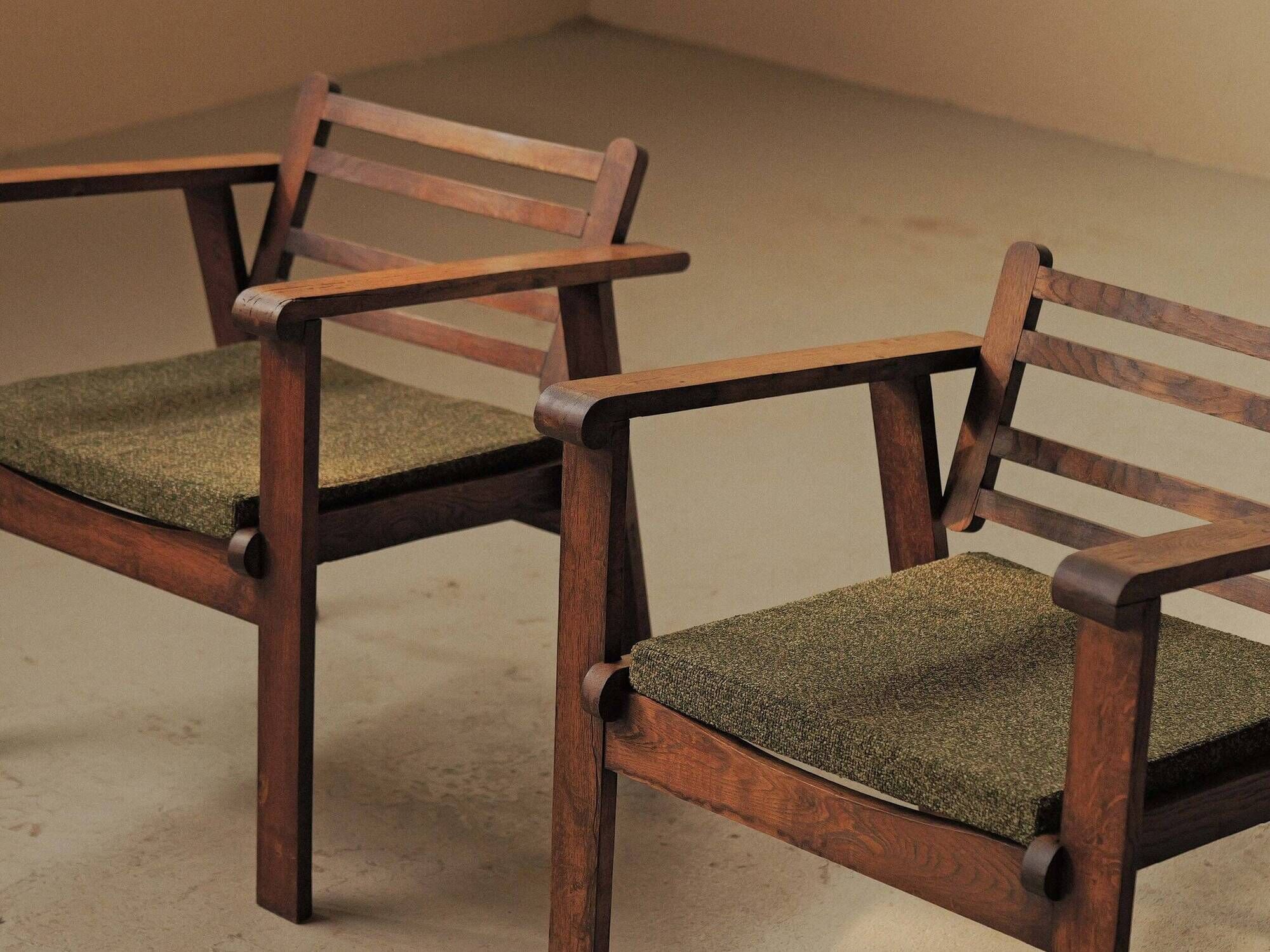 Pair of modernist armchairs in oak, Reconstruction, circa 1940