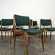 Set of 8 vintage green fabric chairs.