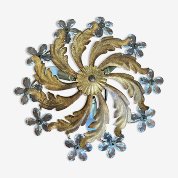 Golden metal ceiling lamp decorated with flowers and foliage