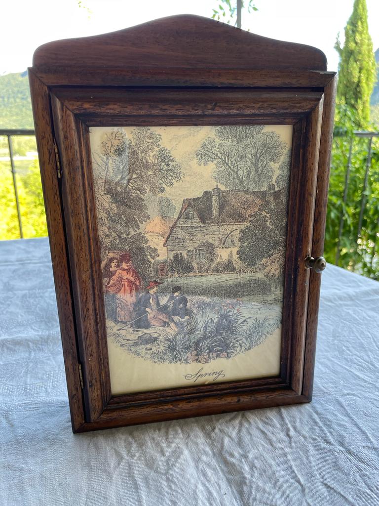 Small walnut key cabinet