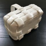 White basket in slurry
