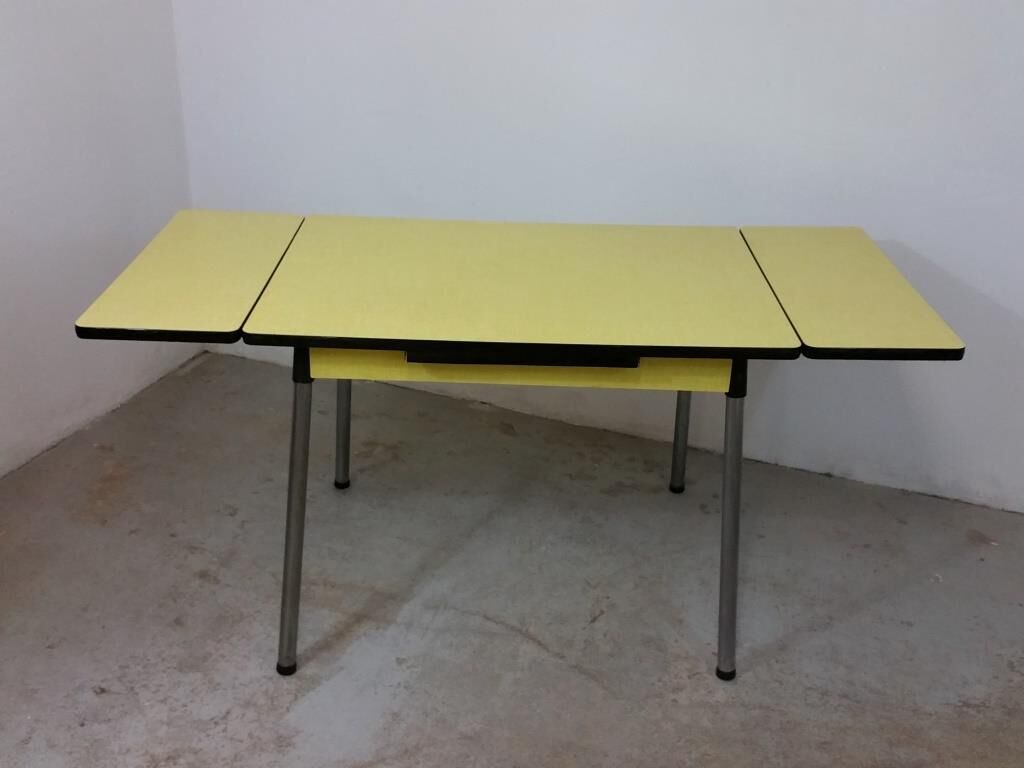 Table and chairs in formica yellow