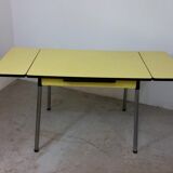 Table and chairs in formica yellow