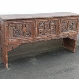 Old wooden console with chains