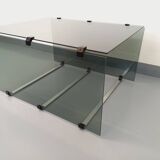 Vintage coffee table in smoked glass, black metal and cast aluminum