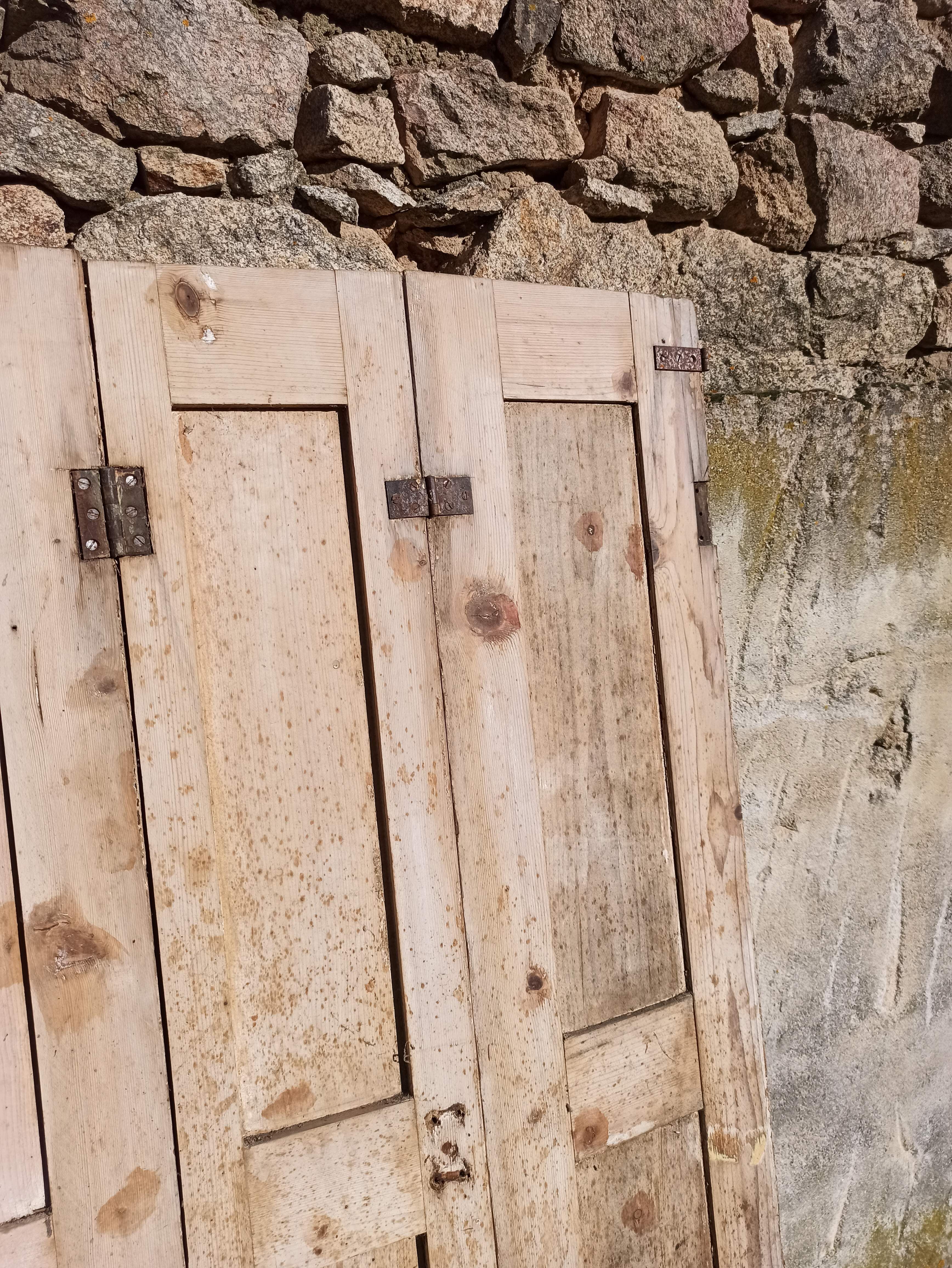 Old trio of wooden screen doors